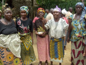 Women singing at village welcome